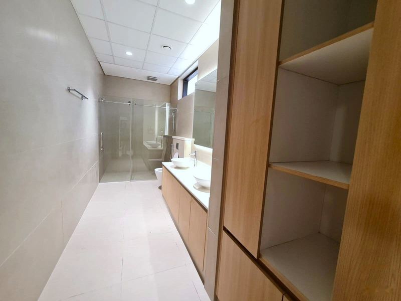 Bathroom with vanity and shower