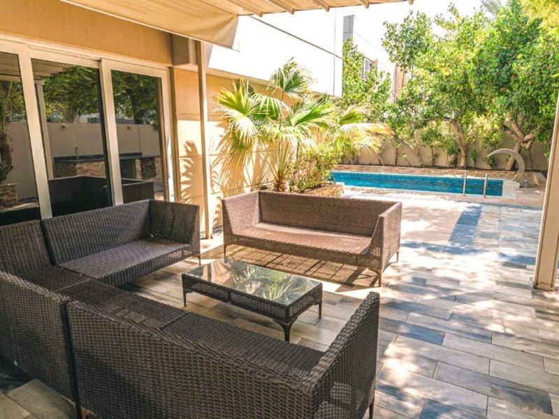 Covered patio beside the pool