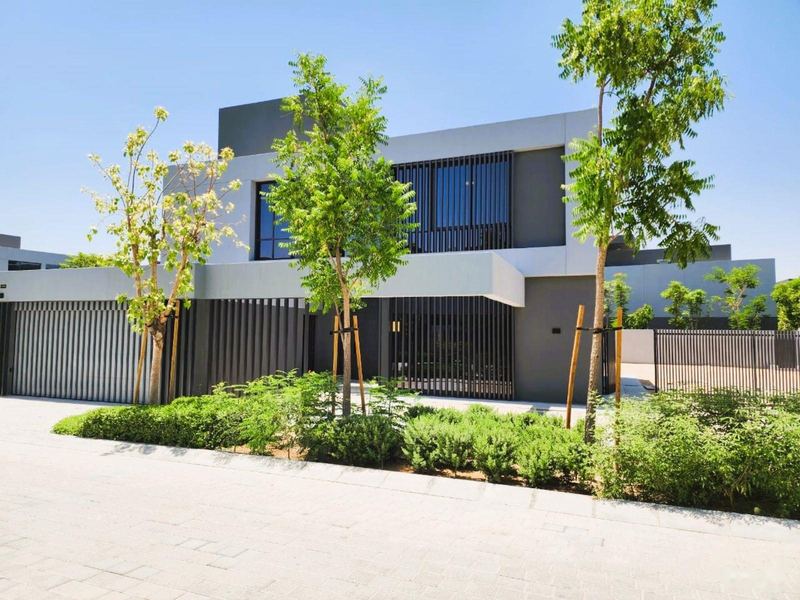 Kaya villa corner elevation with young trees, Masaar
