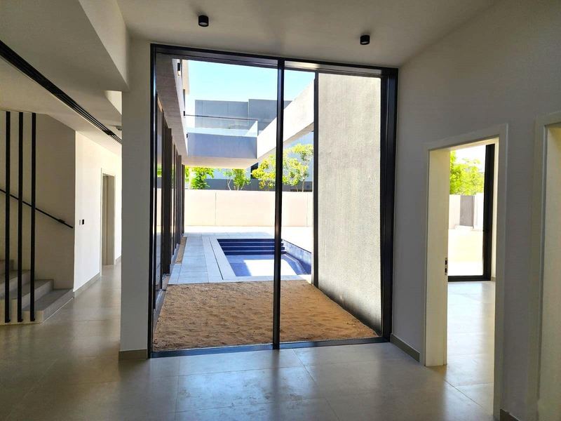 Ground-floor living space opening to the pool terrace