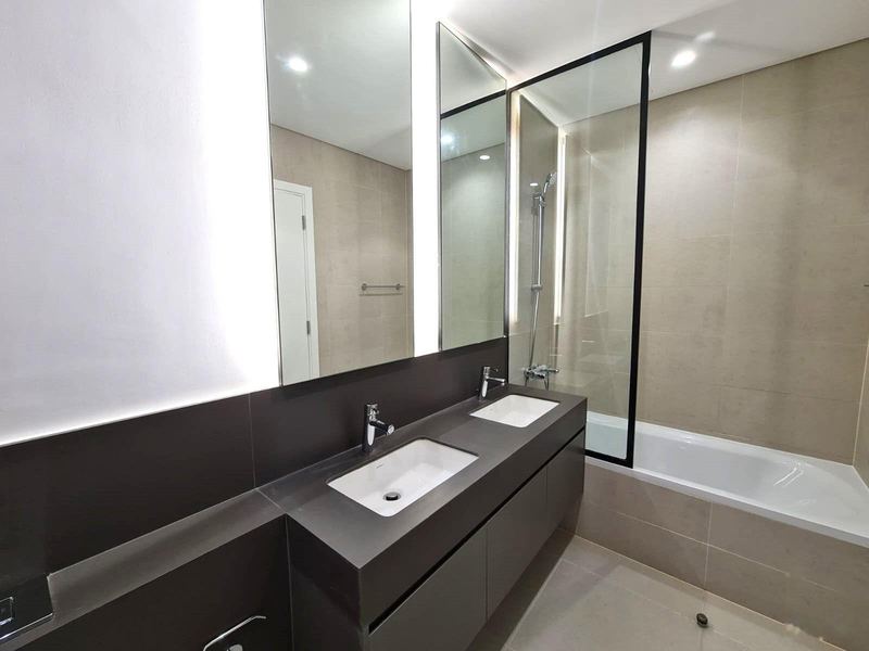 Bathroom with double vanity and bath