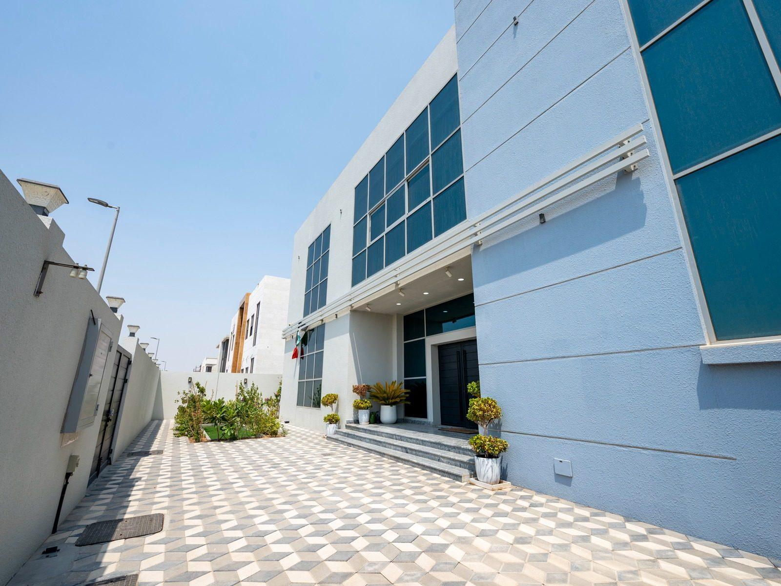 Villa exterior with paved courtyard, Al Suyoh
