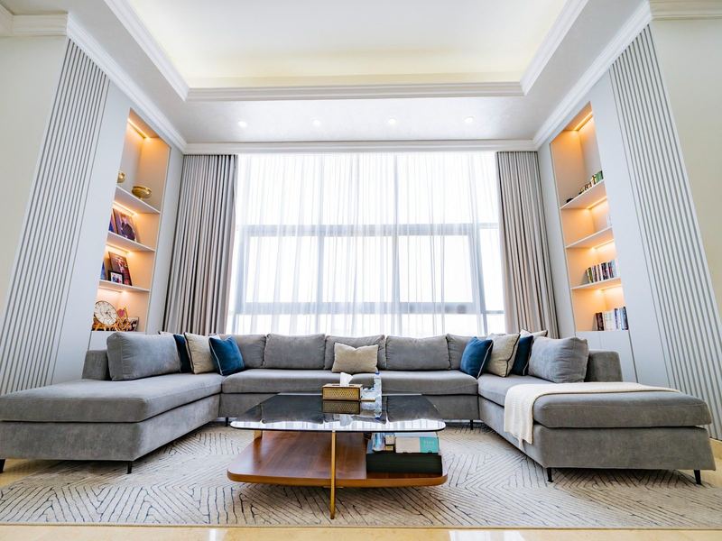 Formal living room with built-in shelving
