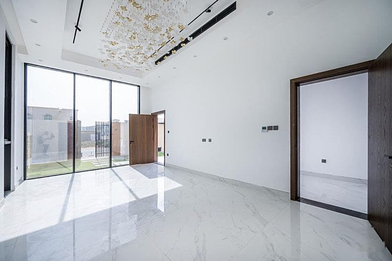Living room with floor-to-ceiling glazing