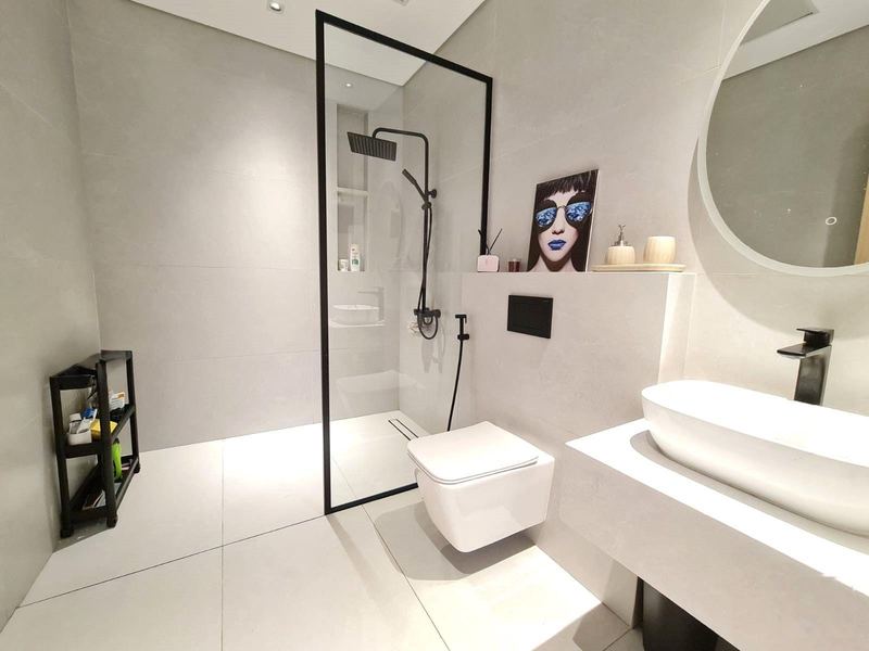 Bathroom with shower and bath