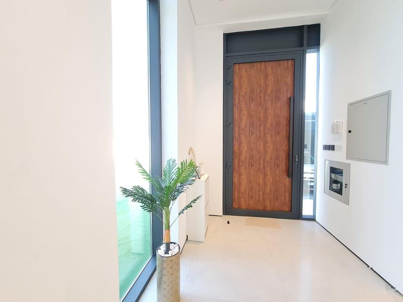 Entrance with timber door