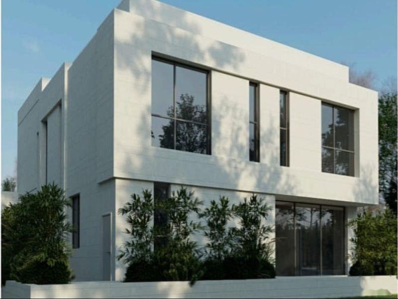Villa facade with large windows. Illustrative image.