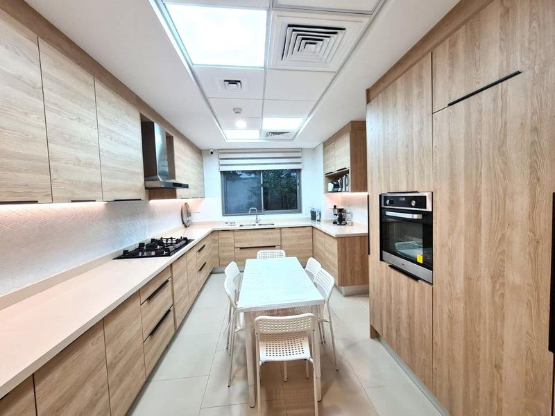 Fitted kitchen with oven and gas hob