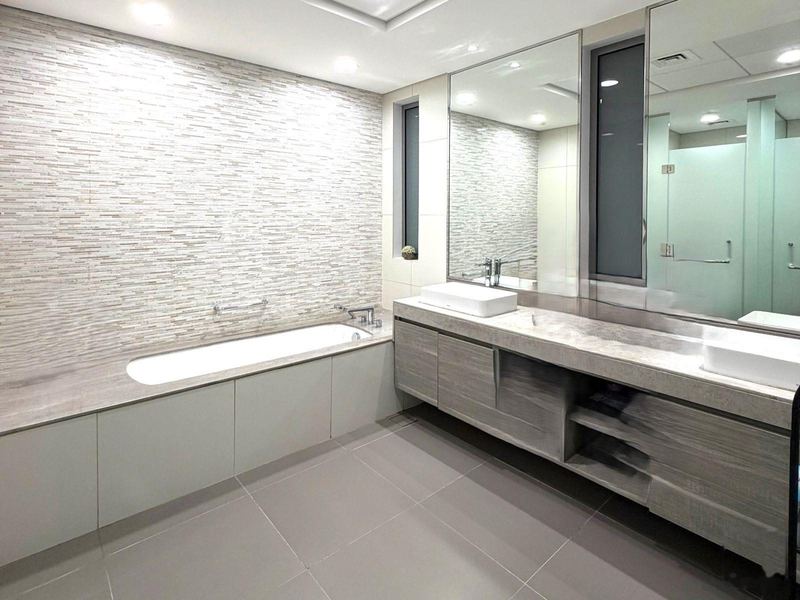 Bathroom with bath and double vanity